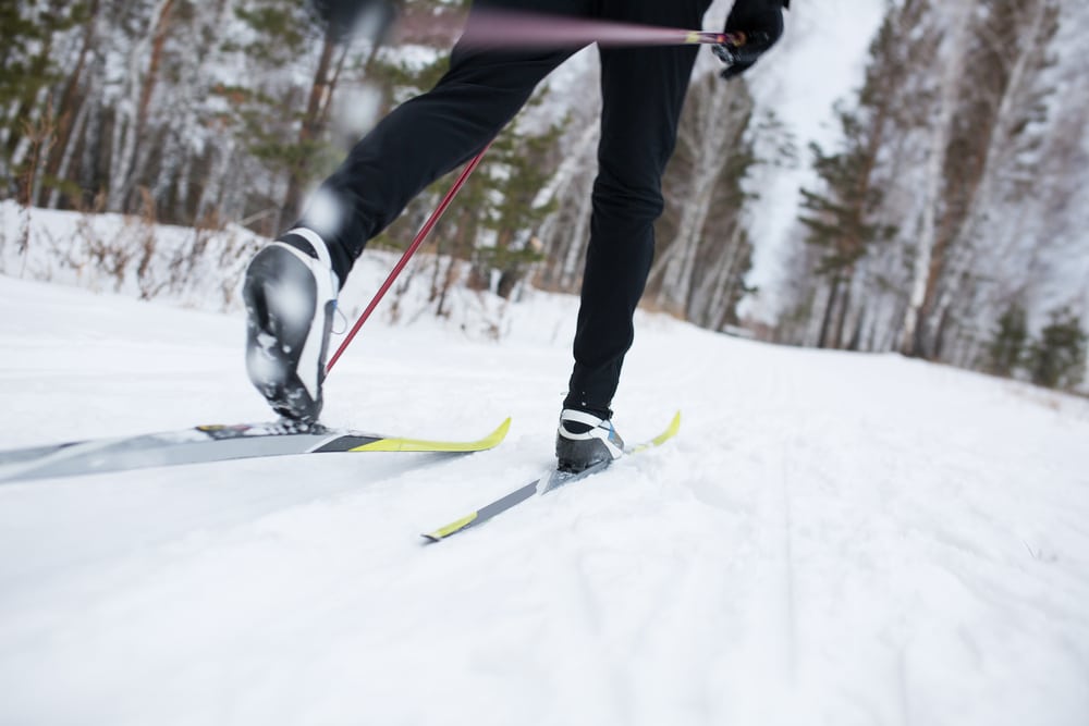 Cross-country skiing through the woods in Wisconsin, one of the best things to do in Wausau in the winter