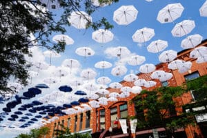 Umbrellas in downtown Wausau, where you'll find many of the top-rated things to do in Wausau, WI in 2023 while staying at our cabins in Wisconsin