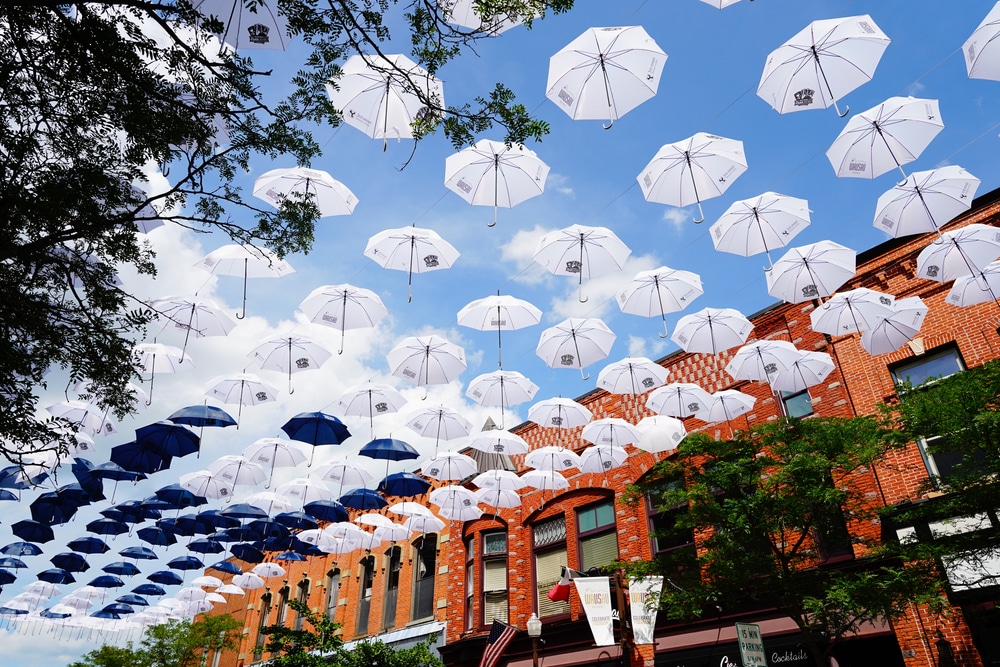 Umbrellas in downtown Wausau, where you'll find many of the top-rated things to do in Wausau, WI in 2023 while staying at our cabins in Wisconsin