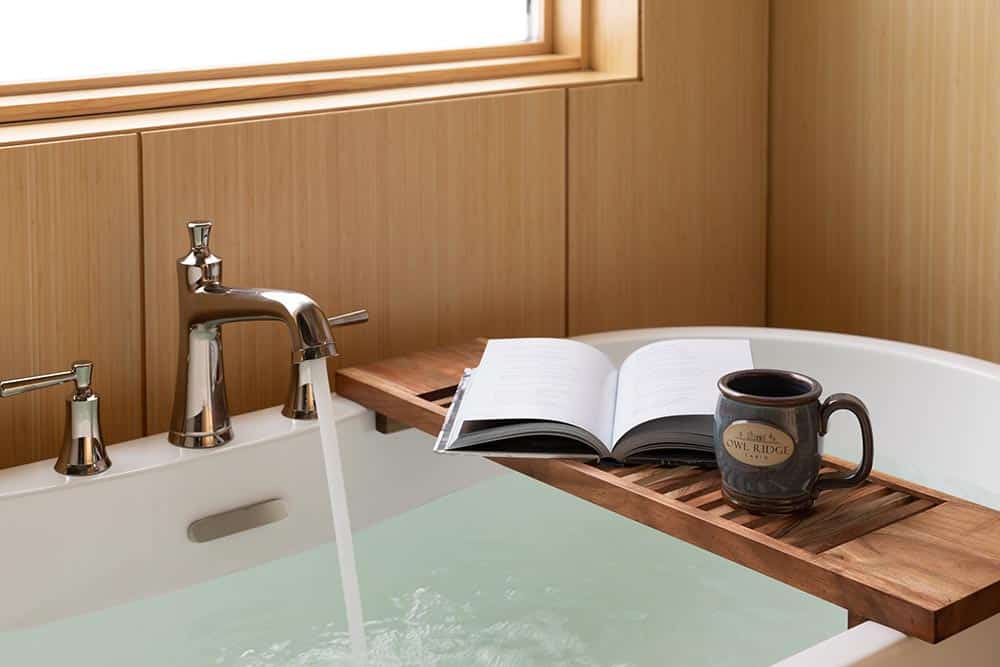 Warm up in this cozy bath at our luxury cabin - the best place to stay in Wisconsin while enjoying the top things to do in Wausau