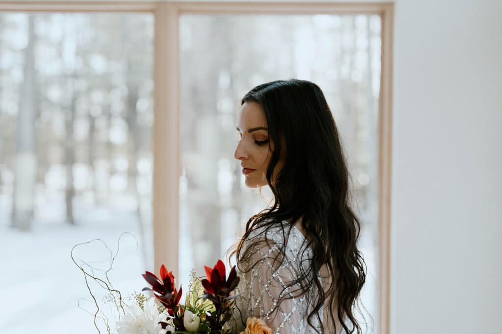 bride during her intimate wedding elopement at our romantic cabin in Wisconsin