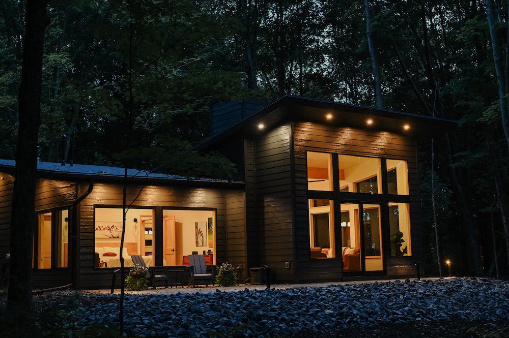 Gorgeous luxury cabins in Wisconsin at dusk - perfect for fall getaways in Wisconsin