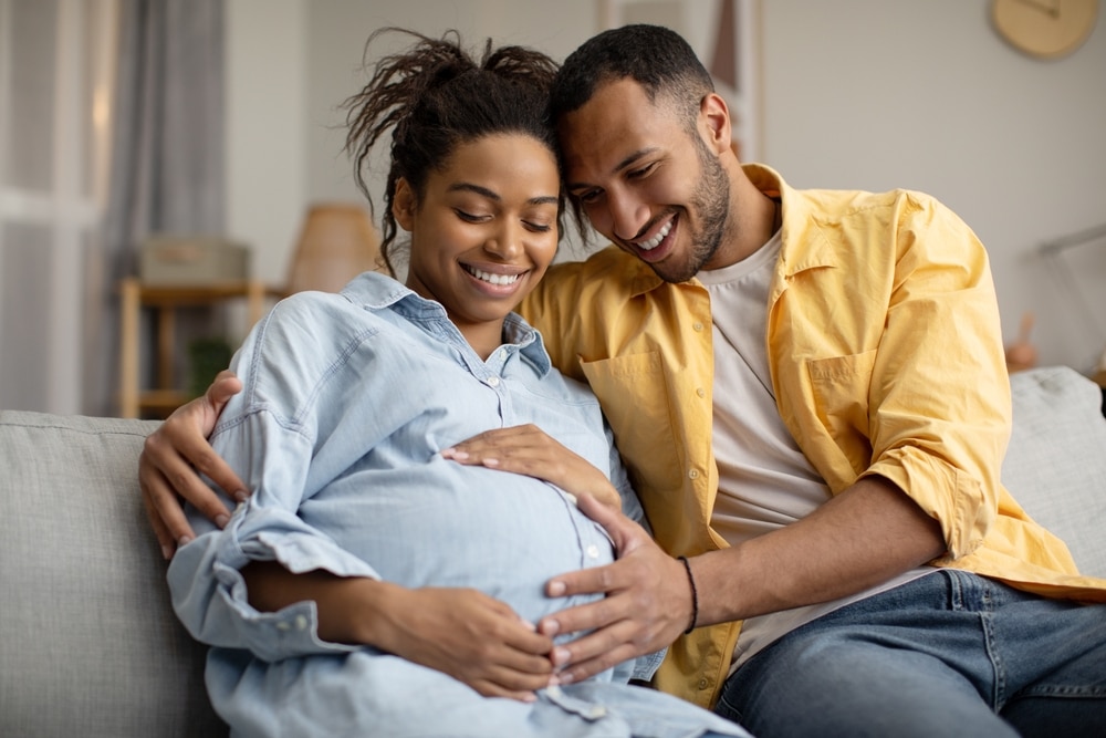 young expecting black couple enjoying one of the best babymoon destinations in Wisconsin